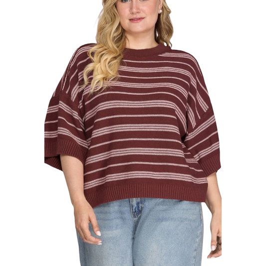 Elevate your everyday style with this wine-colored striped knit sweater top from She+Sky. Designed for the modern plus-size figure, this piece features comfortable half sleeves and a flattering fit that works for any occasion. The classic striped pattern adds visual interest while the soft knit fabric keeps you cozy and confident. Perfect for layering or wearing solo, this versatile sweater top is a wardrobe essential that transitions seamlessly from season to season.