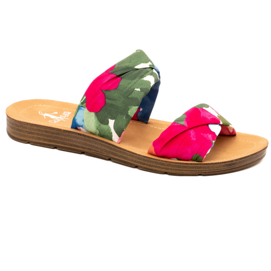 Discover the perfect blend of style and comfort with our With A Twist sandals. These flat slide sandals feature a beautiful floral design, making them the perfect addition to your summer wardrobe. With their easy slip-on style, you can effortlessly add a touch of elegance to any outfit.