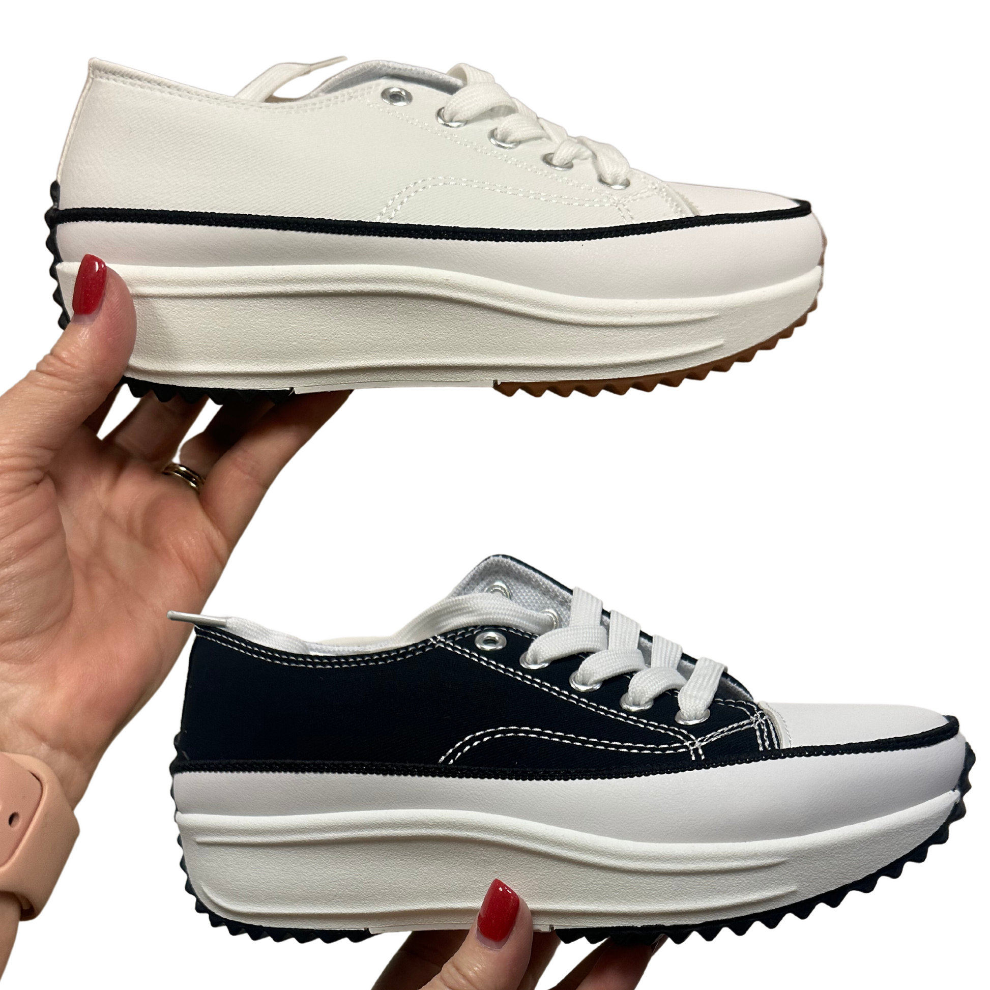 Stay comfortable and stylish in our Women's Sneakers, featuring a lightweight design and colors ranging from white to black. Keep your feet at ease with our quality materials and reliable fit.