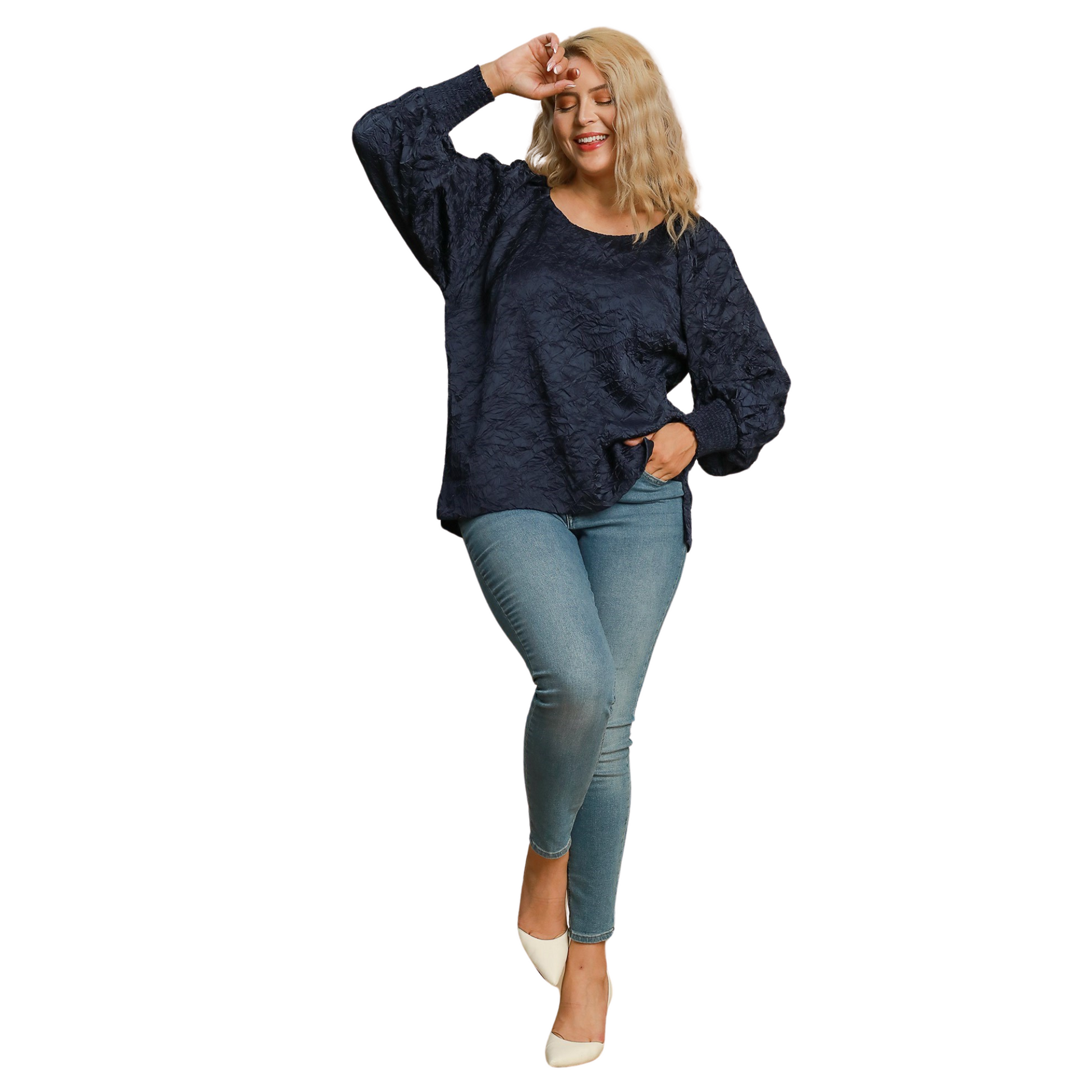 Introducing the Umgee Brand Wrinkled Round Neck Top. This top features a navy color and a unique crinkled pattern to add texture and dimension. Its long, cuffed sleeves are perfect for cooler weather. Designed specifically for plus size individuals, this top is a stylish and comfortable addition to any wardrobe.