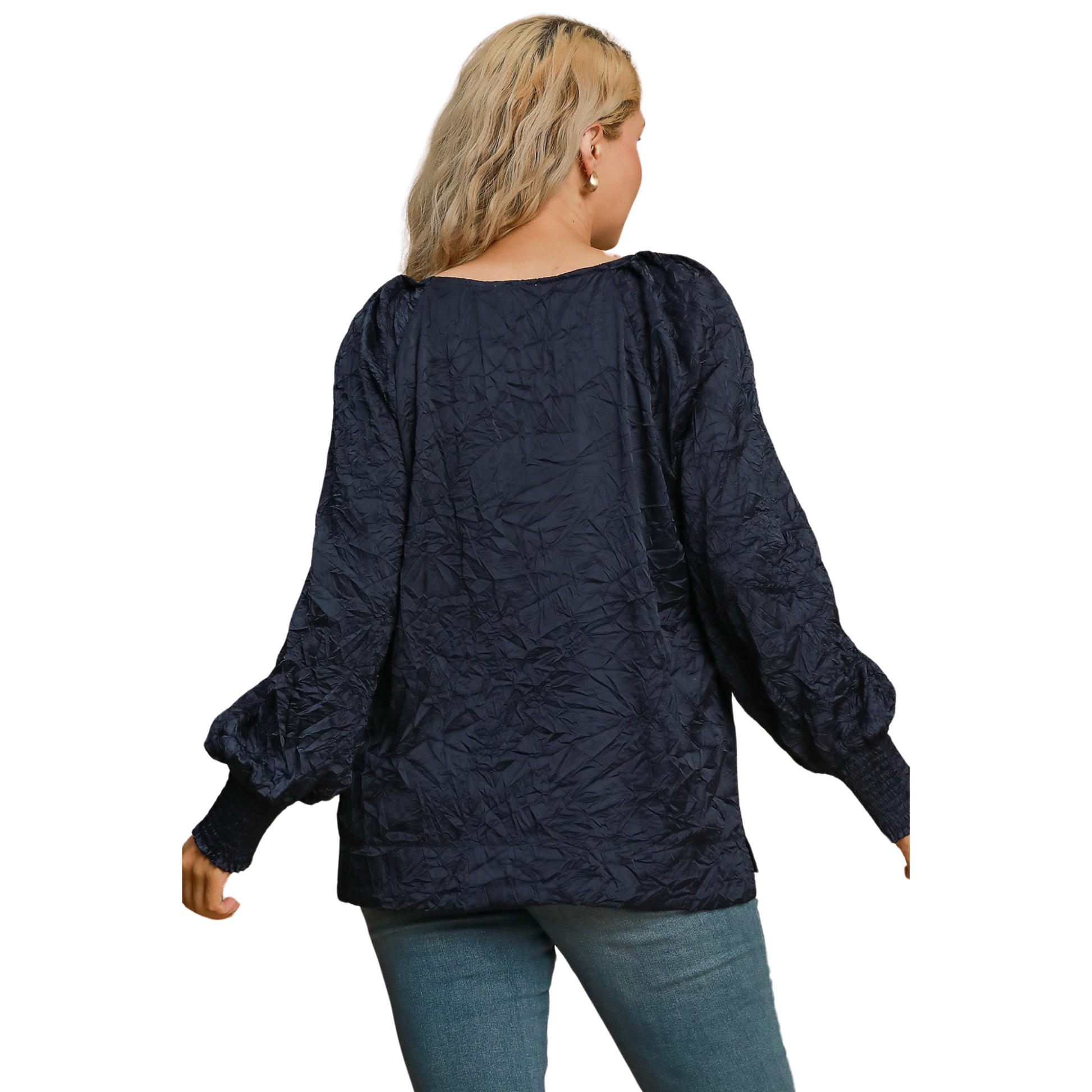 Introducing the Umgee Brand Wrinkled Round Neck Top. This top features a navy color and a unique crinkled pattern to add texture and dimension. Its long, cuffed sleeves are perfect for cooler weather. Designed specifically for plus size individuals, this top is a stylish and comfortable addition to any wardrobe.