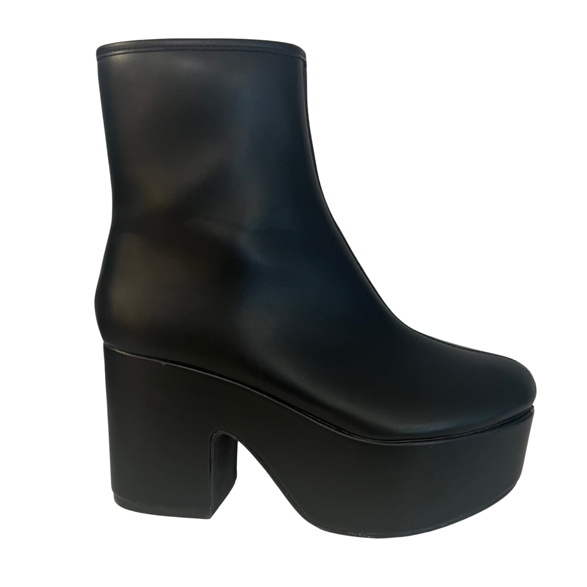 The Xiva by Shushop features a black platform bootie that stands out in any outfit. Its durable construction ensures long-lasting comfort, and the zip up design ensures a secure fit for all-day use. Whether you're looking for a stylish statement or a comfortable everyday shoe, the Xiva checks all the boxes.