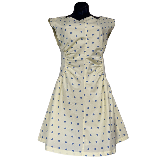 Brighten your wardrobe with this eye-catching Heyson mini dress featuring a cheerful yellow base adorned with blue polka dots. The sleeveless design offers effortless summer style, while the high round neckline provides a flattering, modest touch. Perfect for casual outings, weekend adventures, or any occasion where you want to make a playful statement. The mini length keeps things fun and flirty without sacrificing comfort. 