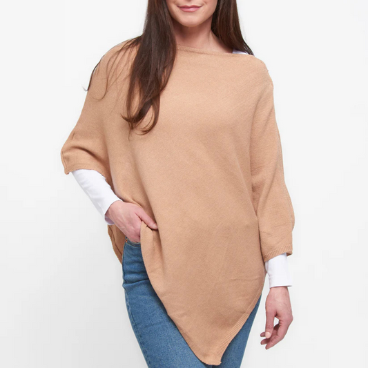 The Zip Shoulder Poncho from Arianna by Howard’s brand combines timeless style with practical design. Crafted in a versatile beige tone, this poncho features a zippered shoulder detail that allows easy wear and adds a modern touch. Its relaxed fit offers comfort and effortless layering, making it a sophisticated choice for transitional weather or casual elegance. Ideal for those seeking both functionality and refined aesthetics.