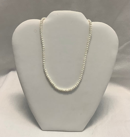 This Fresh Water Pearl Necklace is the perfect addition to any wardrobe. With its classic look, the necklace is made of real fresh water pearls, making it a luxurious, timeless piece. A must-have for any jewelry collection, this necklace brings style and elegance to any look.